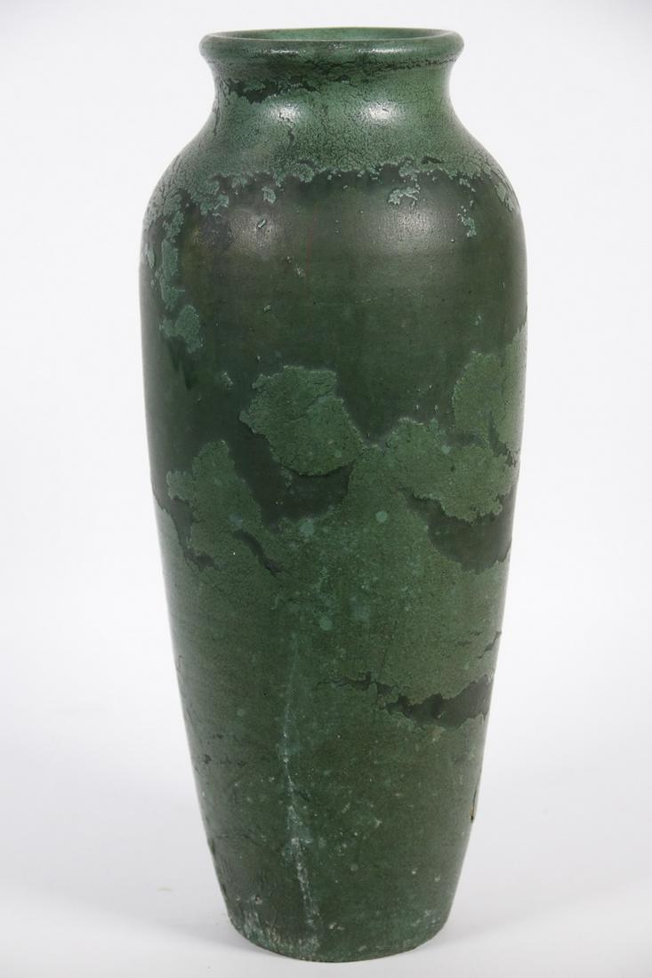 AMERICAN ARTS & CRAFTS ART POTTERY VASE: Early 20th c. Slender Art Pottery Vase, unsigned but possibly by Wheatley (Cincinnati, OH, 1903-10), with curdled matte green glaze, 14 1/2" high, 5 3/4" diam. 1 1/2" x 1 1/2" occlusion near base with