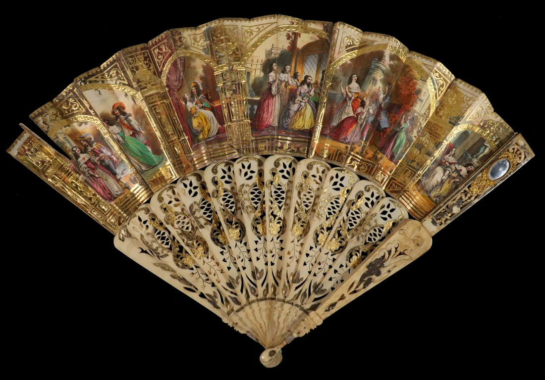LATE 19TH C. FRENCH FOLDING HAND FAN: Gilt and Reticulated Opera Fan with hand colored litho and giltwork paper top covering, one end stick mounted with a tiny oval mirror, 10 1/2" x 20" when opened. Old repairs to end sticks, paper split