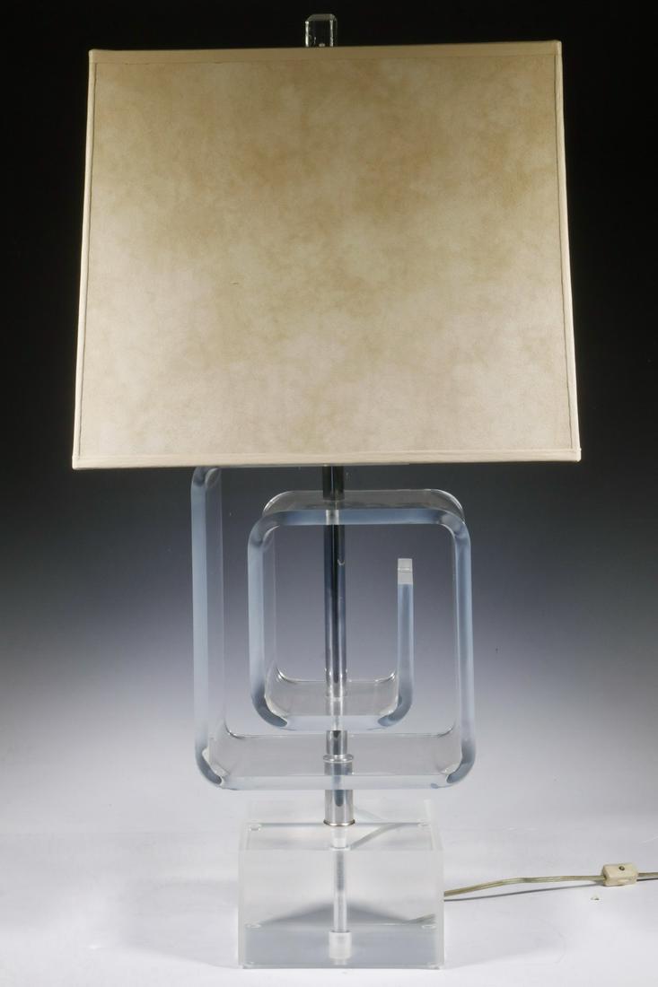 LES PRISMATIQUES LUCITE AND CHROME TABLE LAMP: 1970s Era Lucite Spiral Form Table Lamp by Les Prismatiques, with chrome stem and fittings, square Lucite base, faceted Lucite finial, marked 'Les Prismatiques' at top of stem, double socket fixture w