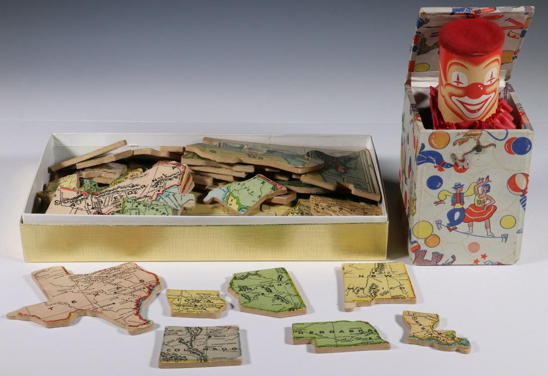 (2) VINTAGE TOYS - PUZZLE MAP & JACK-IN-THE-BOX: Reversible US/world map puzzle by Wilder (YLDR) St. Louis, circa 1930s, measures 12" x 20" completed, all pieces present, surface wear, some edge losses; and Jack-in-the Box toy, hook latch cardboard