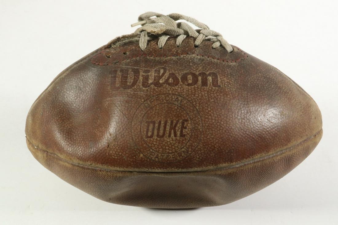 WILSON "THE DUKE" FOOTBALL: Vintage NFL "The Duke" Football as in use since the creation of the NFL in 1941. Per Wilson: "The Duke" NFL football was named in honor of the game's pioneering legend and NY Giants owner, Wellington 