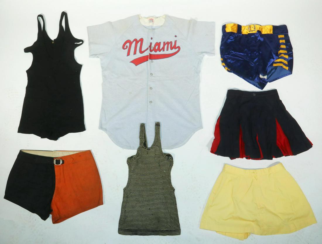 (6) VINTAGE ATHLETIC UNIFORMS: Including: 1930s Princeton Wool Basketball Shorts; PLUS 1940s Michigan Satin Basketball Shorts; PLUS 1960s Miami Cotton Baseball Jersey by Wilson, number 20, size 44; PLUS Solid Black All-in-one Wool 