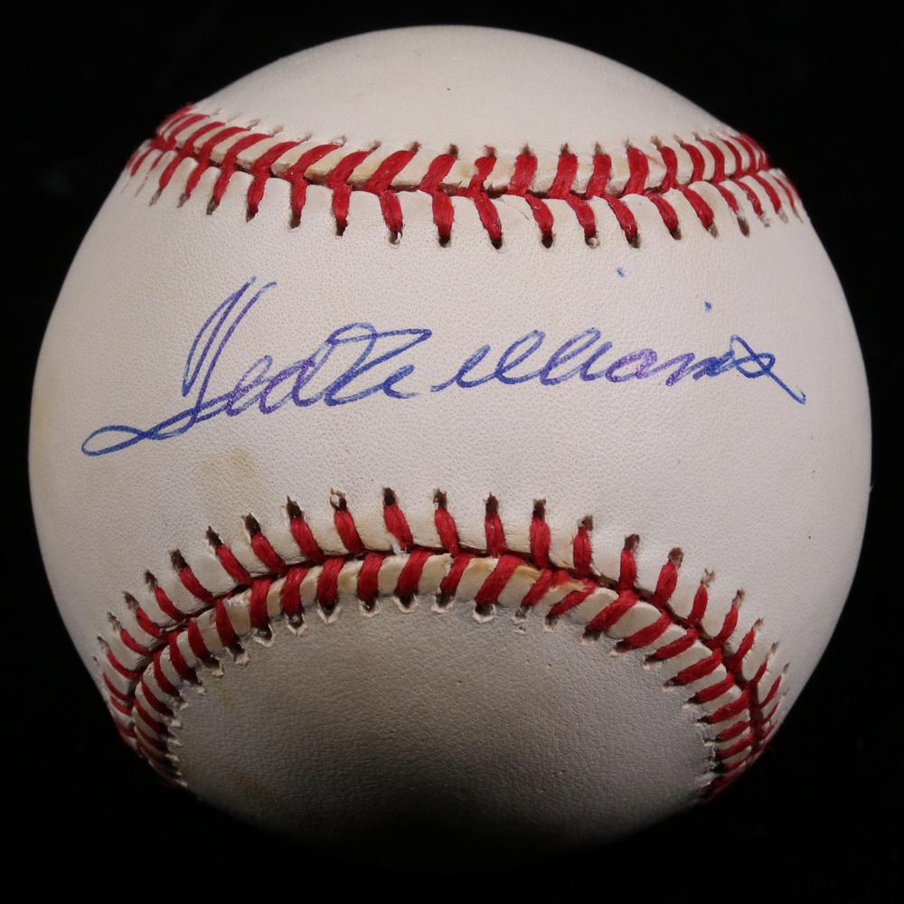 TED WILLIAMS SIGNED RAWLINGS AL BASEBALL: Ted Williams signed Rawlings American League baseball with holder. Also COA from Forensic Document Services. Discoloration.