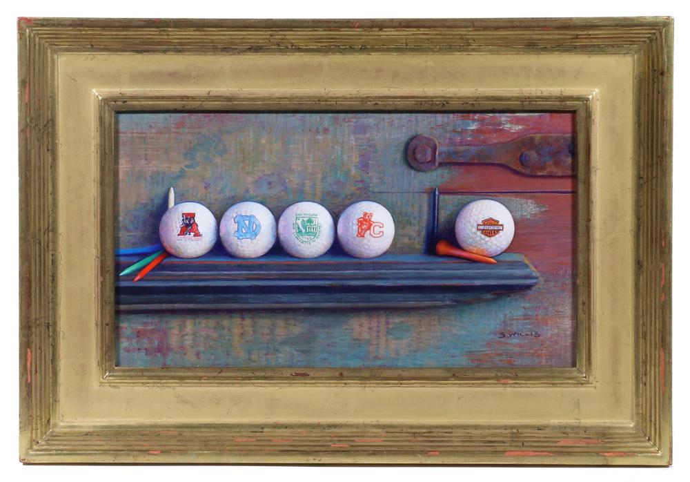 SID (SIDNEY) WILLIS (MA/NH, 1930- ): "Odd Ball", oil on masonite, signed lower right, titled verso, depicting a collection of branded golf balls, with a COA from the Guild of Boston Artists dated Dec. 2006, in a gilt stepped panel frame,