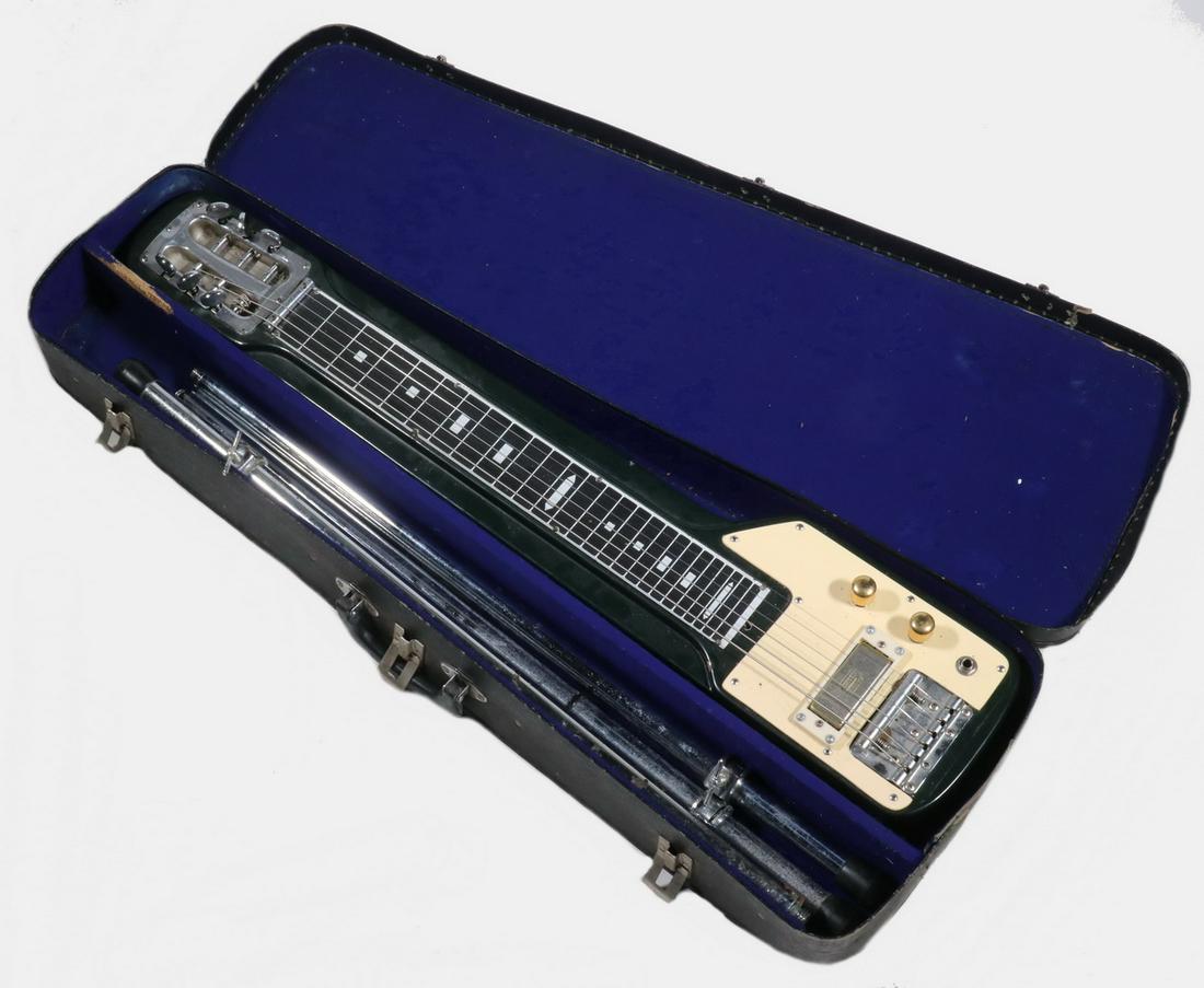 CASED STEEL GUITAR, GUYATONE: Vintage mid-1960s Guyatone Lap Steel Slide Guitar Model 96C in black. Japanese copy of a Fender Stringmaster. Includes original case with three screw-in chrome legs. 32" long. Light corrosion.