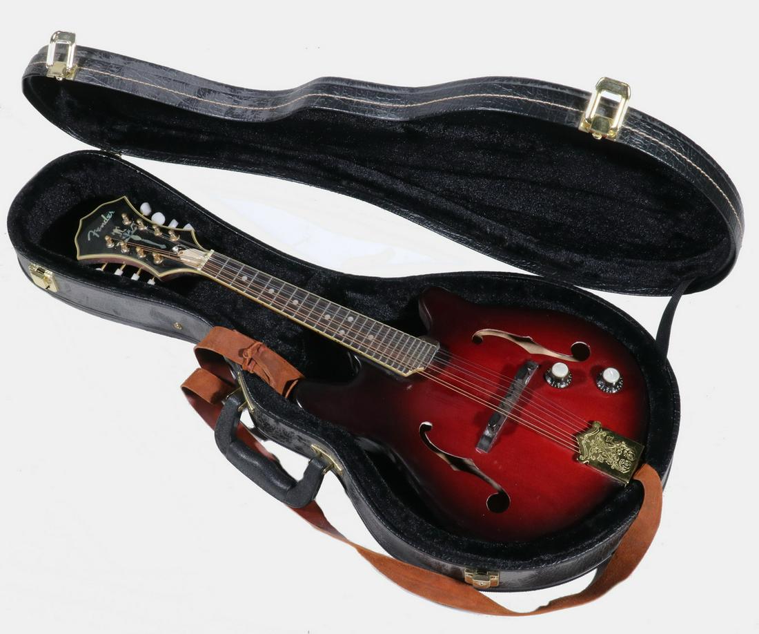 ACOUSTIC/ELECTRIC FENDER 8 STRING MANDOLIN: Fender FM62SCE/TR Mandolin in cherry sunburst, one of the best acoustic-electric mandolins ever made. Solid spruce top, carved maple back and sides, gold tuners with pearloid buttons, gold tailpiece, 