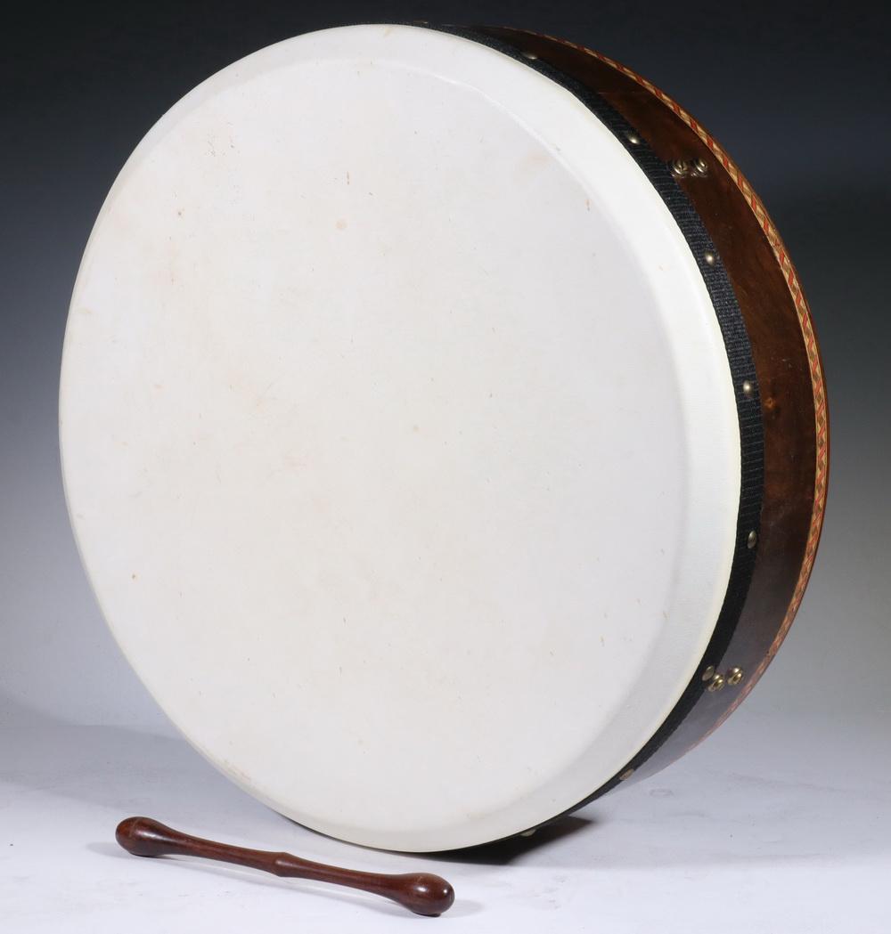 IRISH DRUM IN SOFT CASE: Tuneable Bodhran by Michael Vignole, made in Ireland, the Claddagh Angle model, with Kerry style double-ended stick, in CNB soft case, with Conor Long's "Bodhran Tutor". 5 1/2" x 18" diam. Very good,