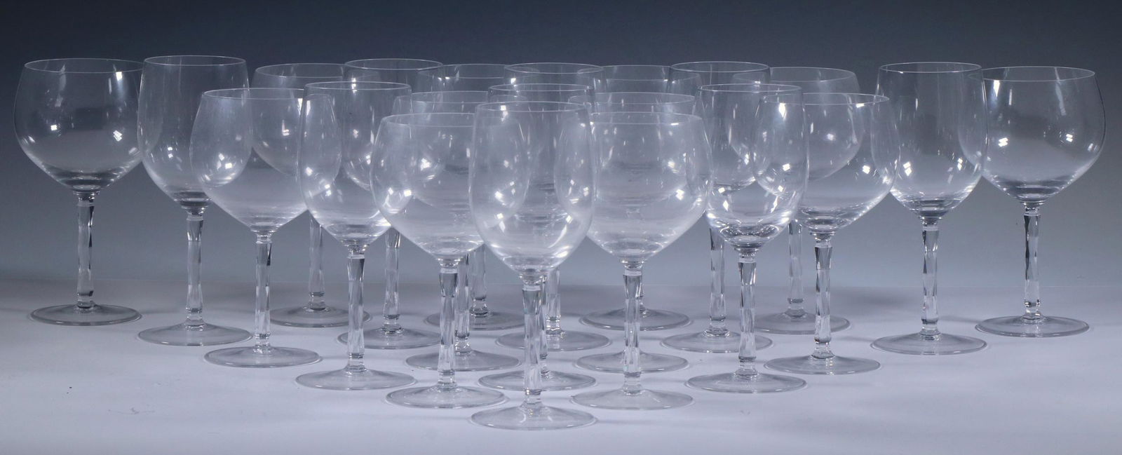 (26 PCS) CRYSTAL STEMWARE: Set of (26) Pieces of Matching Pattern Stemware, faceted stems, acid etched maker's mark on base, including (13) wine glasses, 8" high; and (13) balloon wine glasses 7 1/2" high. Good condition.