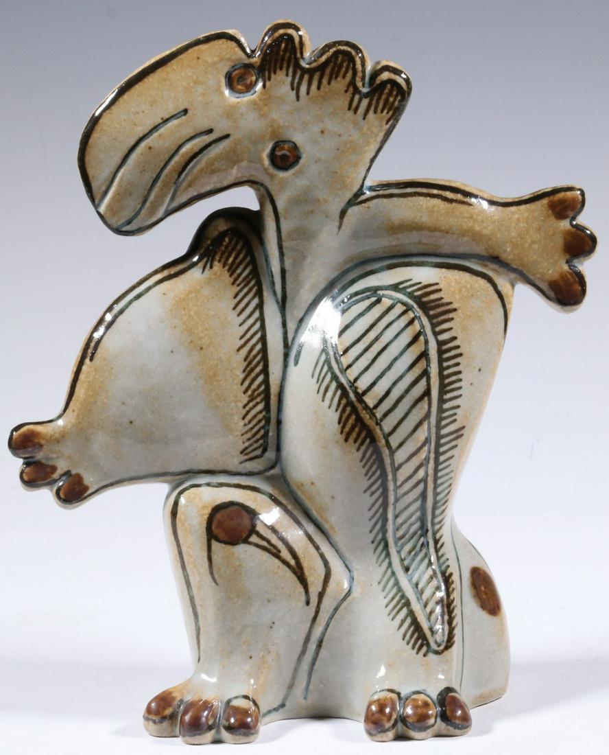 BING & GRONDAHL FIGURE BY STEN LYKKE MADSEN (DENMARK,: Danish Stoneware Figurine, designed by Sten Lykke Madsen from his 'Abstract' line of figures, #7049, depicting a standing figure in tan and brown glazes, with B&G mark and inked '5H' on base, 9 3/4" h