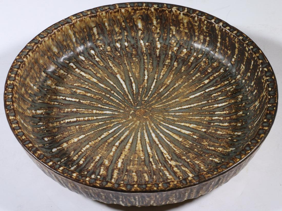 GUNNAR NYLUND (SWEDEN, 1904-1997) STONEWARE BOWL: Mid-Century Swedish Stoneware Bowl by Gunnar Nylund for Rorstrand, Rubus pattern with textured design, base with the Rorstrand mark, 'GN', 'Sweden' and '8', 2 1/4" high, 10 1/4" diam. Good condition.