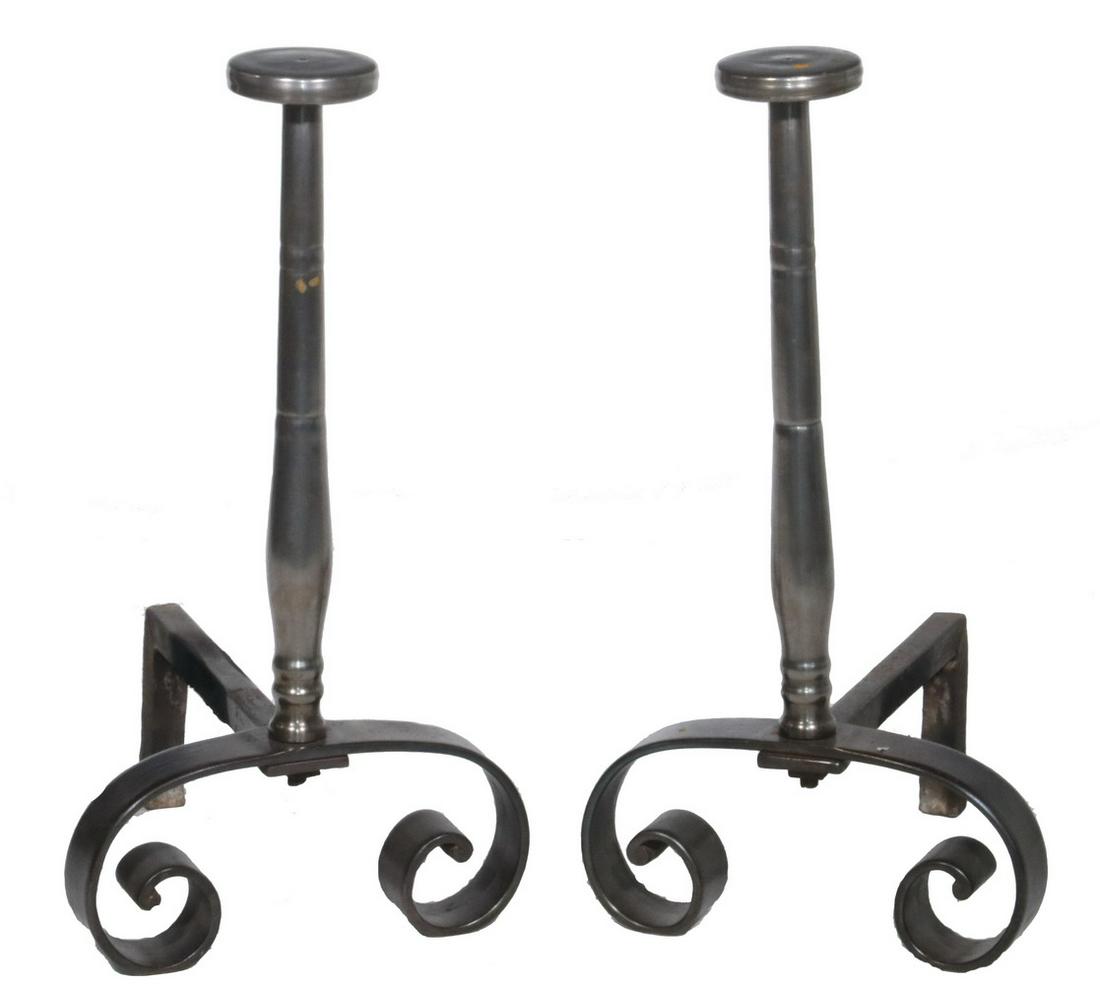 MODERN ANDIRONS: Late 20th c. Large Andirons having round platform tops set on spindle turned polished steel posts, raised on scrolled forged strap iron bases, with cast iron dogs, 25 1/2" x 13" x 15". Good condition.