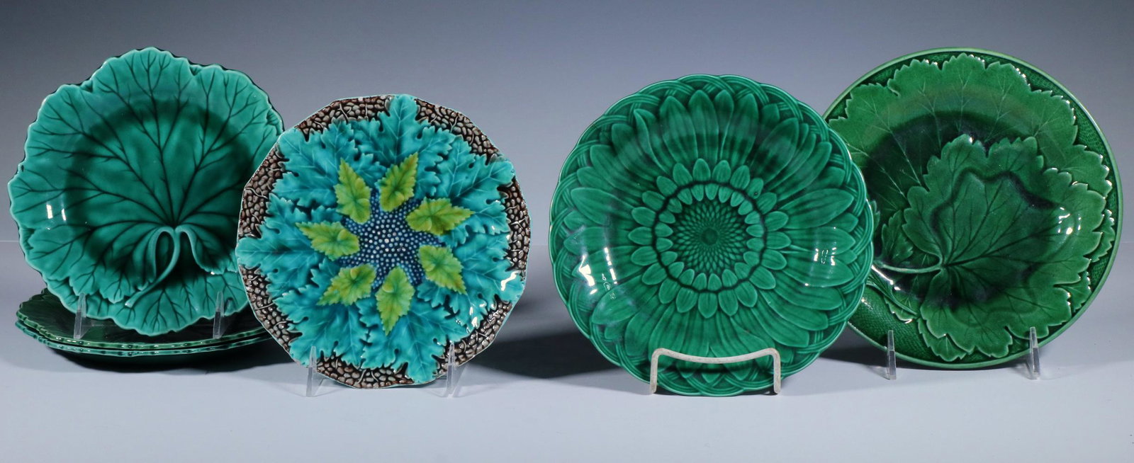 (6) MAJOLICA PLATES: Lot of (6) Assorted Majolica Leaf Design Plates, four by Wedgwood, others unmarked, 8" to 8 3/4" diam. Minor crazing, multicolor plate has tiny edge frit.