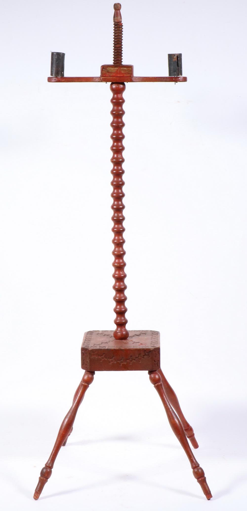 18TH C. FLOOR STANDING ADJUSTABLE CANDLESTAND IN RED: Two-Socket Screw Top Thimble Turned Spindle, set on stamp decorated platform raised on four splayed slender turned legs, 33 1/2" tall, 12" foot to foot. Very good condition.