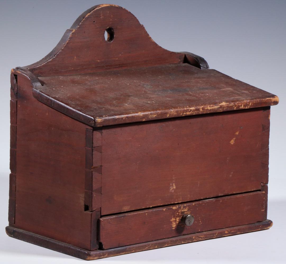 RED PAINTED WALL BOX WITH DRAWER: 18th c. Pine Wall Box, red painted surface, exposed dovetailed construction, with tombstone shaped back and hinged slant top lid with two open interior compartments, single drawer below with three int