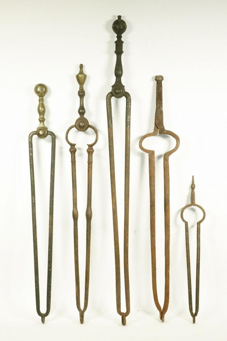 (5) EARLY FIREPLACE TONGS: Lot of (5) 18th and 19th c. Iron Fireplace Tongs, most with brass tops, sizes range form 15 1/4" to 31 1/4". Surface wear and rust.