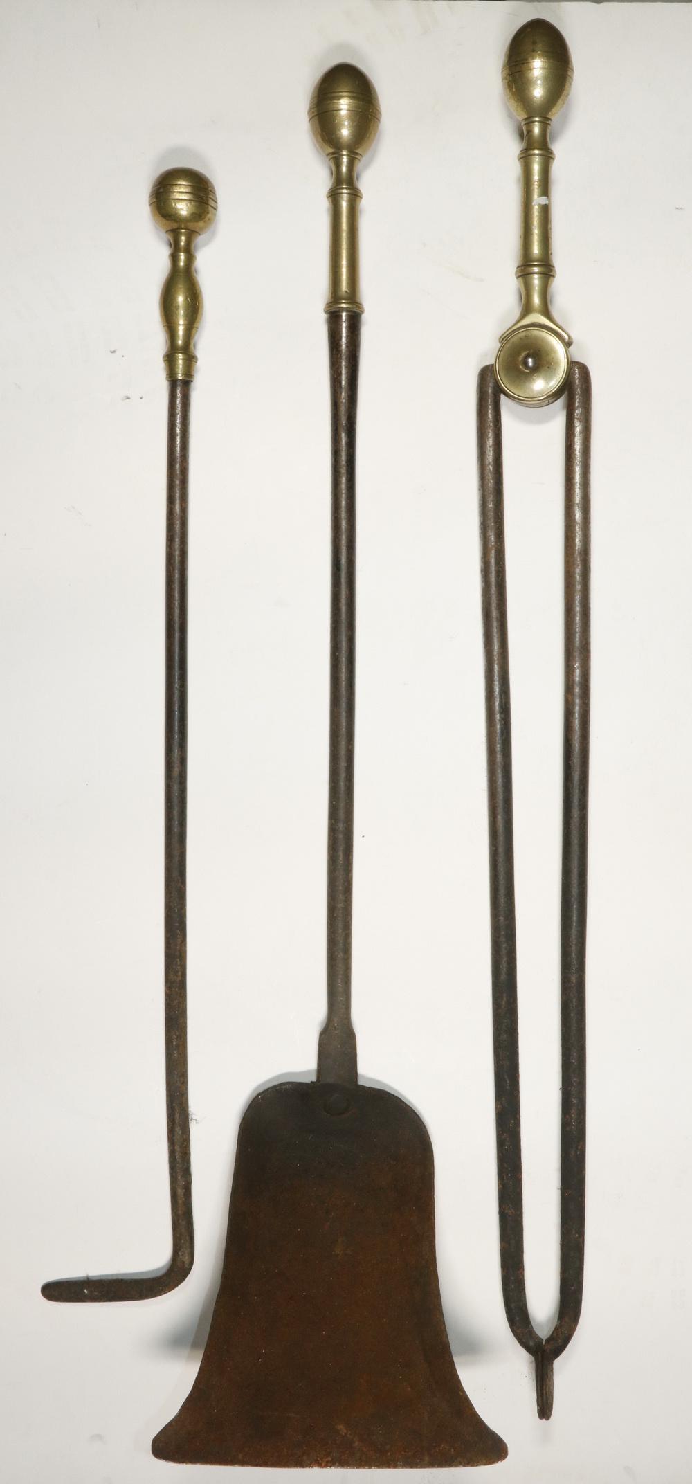 (3 PCS) EARLY FIREPLACE TOOLS: Group of (3) Early 19th c. Fireplace Tools, in iron with brass tops, pattern of two matches exactly, one is similar, including: log tongs, shovel and poker, 22" to 27" long. Surface wear and rust.