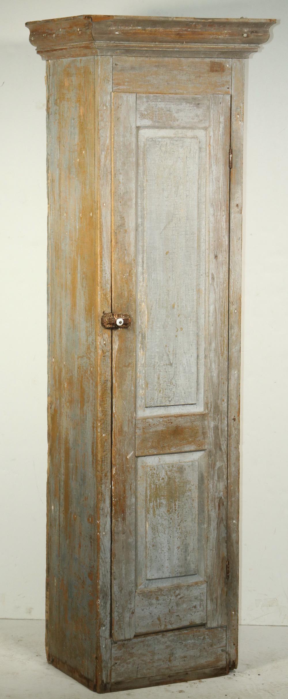 PAINTED CHIMNEY CUPBOARD: 19th c. Blue Painted Chimney Cupboard, with molded flat cornice top, single two-panel door with Victorian iron latch, three interior shelves, 71 1/4" high, 22" x 15". Cornice chips, side shrinkage cra