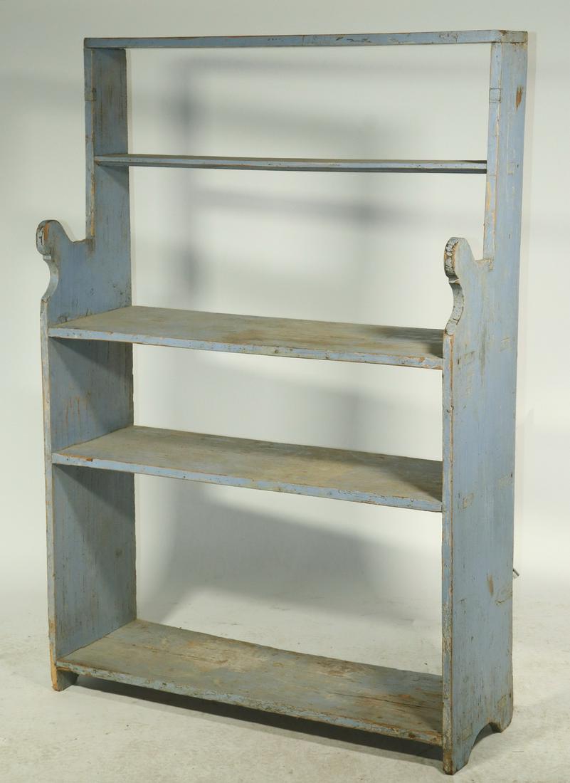 PRIMITIVE PAINTED STEPBACK BUCKET BENCH: 19th c. Blue Painted Stepback Bucket Bench, mortise and tenon construction, open back with three shelves, shaped side panels, 57 1/2" high, 39 1/4" x 13". Paint losses, surface wear.