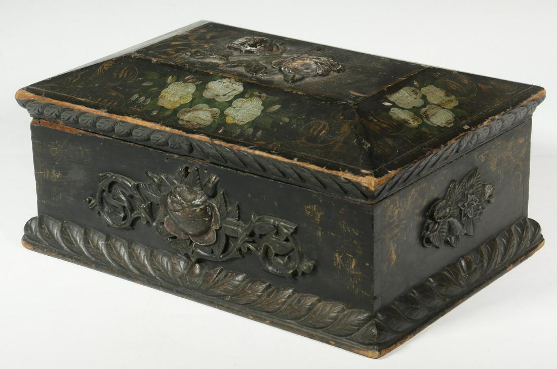 CARVED LETTER BOX: 19th c. Carved and Painted Letter Box, with hinged lid, carved floral sprays and base edge molding, surface with painted and gilded flowers on a black background, 6 1/2" high, 12 3/4" x 8 3/4". Paint 
