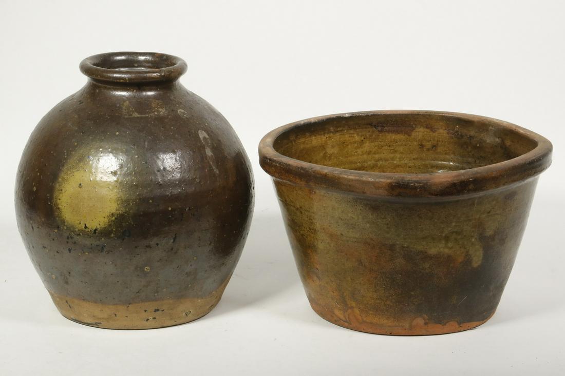 (2 PCS) REDWARE POTTERY, ONE ATTR. TO BELMONT, WI: Lot of (2) Pieces of 19th c. Redware, incl: Ovoid crock attributed to Belmont, WI, brown and yellow-green glaze, 9" high, 8" diam., good condition; and Flower pot, red and green glazed, 6" high, 10 1/