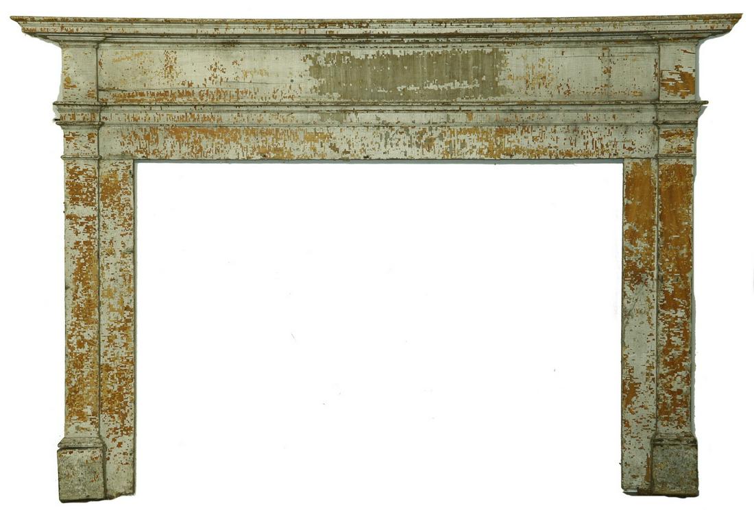 WOODEN MANTEL: Early 19th c. Painted Wooden Fireplace Surround, with mantel board and molded cornice, surface with multiple layers of paint (white over ochre and red), 57" high, 83" x 6". Paint losses.