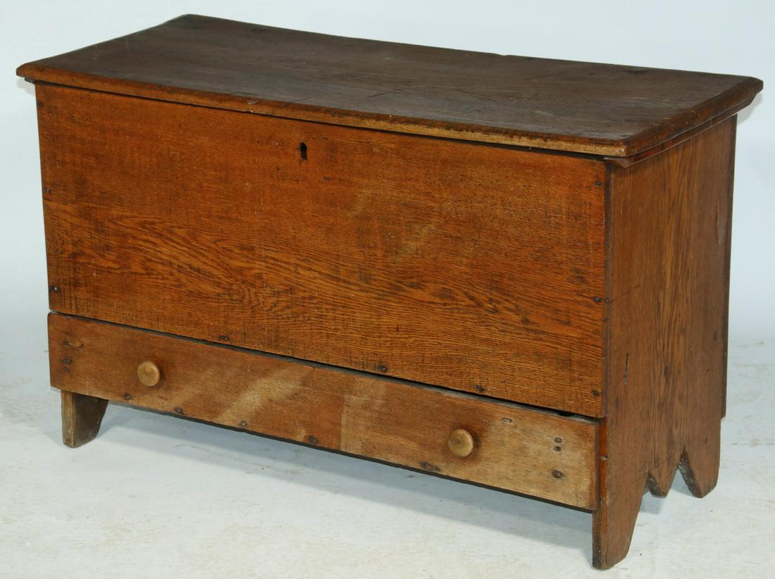 OAK BLANKET CHEST: 18th c. Oak Blanket Chest, with single drawer, plank construction, beveled edge single plank lid with batten ends, snipe hinges, cut-out ends, 26" high, 43" x 18". Surface wear and scratches.