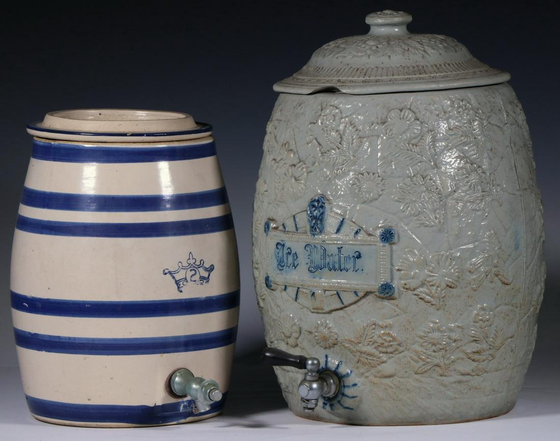 (2) STONEWARE WATER COOLERS: Lot of (2) Late 19th - Early 20th c. Stoneware Water Coolers, incl: Blue striped two-gallon cooler with crown capacity mark, probably by Robinson-Ransbottom Pottery (Ohio), with lid and metal spigot,