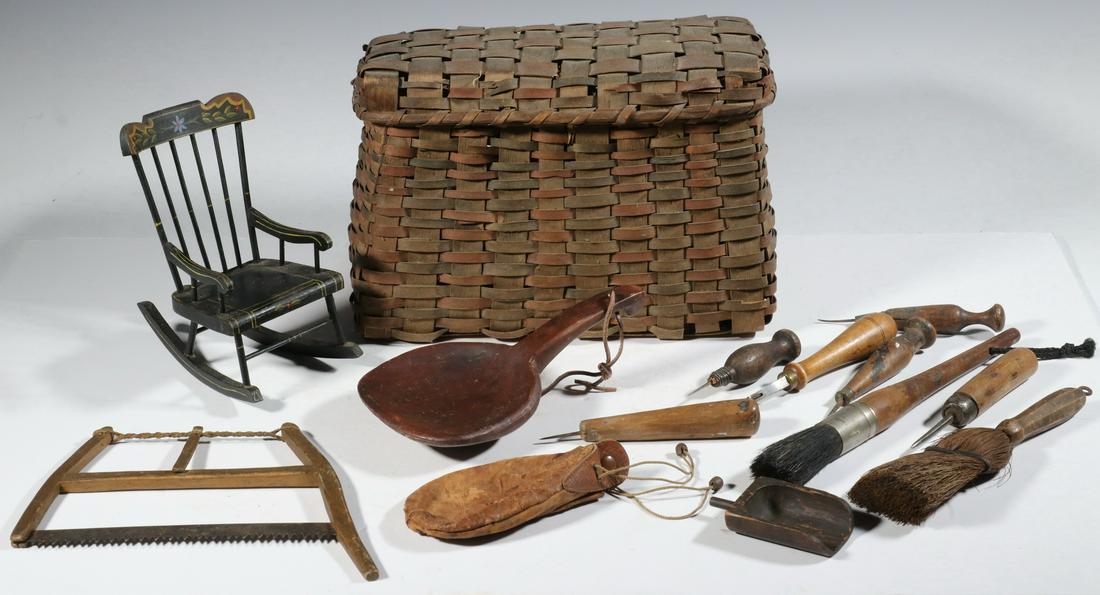 LIDDED BASKET WITH (13) COUNTRY SMALL ITEMS: 19th c. Lidded Splint Basket, containing a collection of assorted early tools and miniatures, incl: (6) wood handled punch and roller tools; (2) wooden scoops; (2) wood handled brushes; (1) leather mo