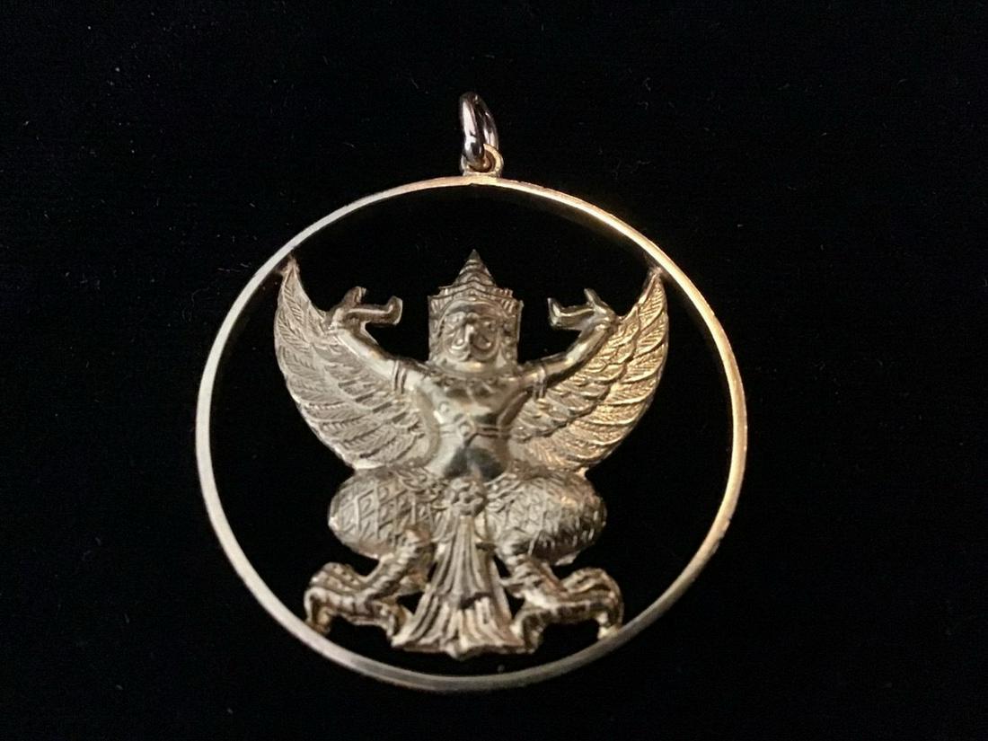 18K GOLD PENDANT: 18K Gold Balinese Deity Form Pendant, 4.7 dwt, 1 3/8 diam. Fine condition.