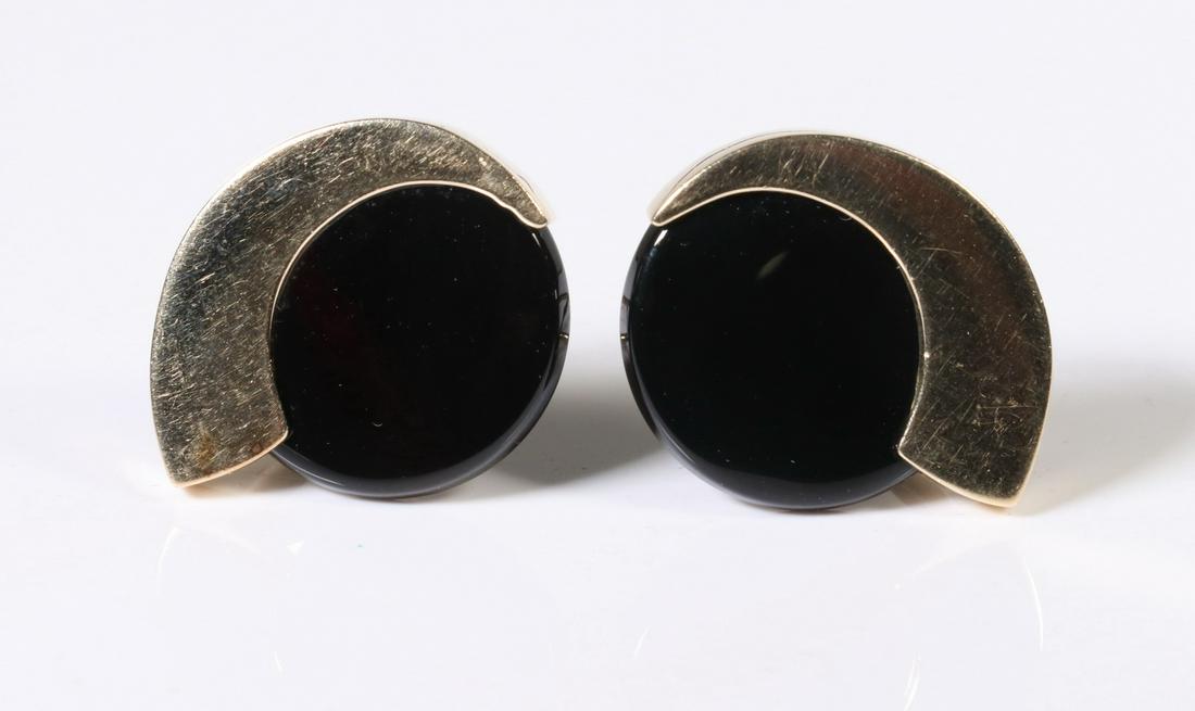 14K GOLD & ONYX EARRINGS: Pair of 14K Yellow Gold and Black Onyx Earrings, with omega clasps, each stamped '14K' and with maker's mark 'MAZ', 7/8" x 3/4", 7.1 dwt tw. Good condition.