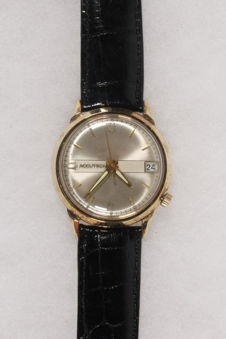 BULOVA GENT'S WRISTWATCH: Vintage Bulova Accutron Wristwatch with 14K gold filled round head and date, serial #B58172 M7. Recently serviced, with black crocodile band.