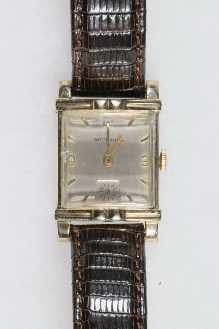 WITTNAUER GENT'S WRISTWATCH: Vintage Wittnauer Tank Form Wristwatch with gold filled square head. Recently serviced, with new brown genuine lizard band. Small inclusion on left side of crystal.