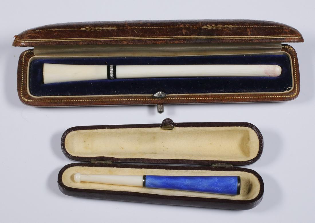 (2) CIGARETTE HOLDERS (1 of 1)