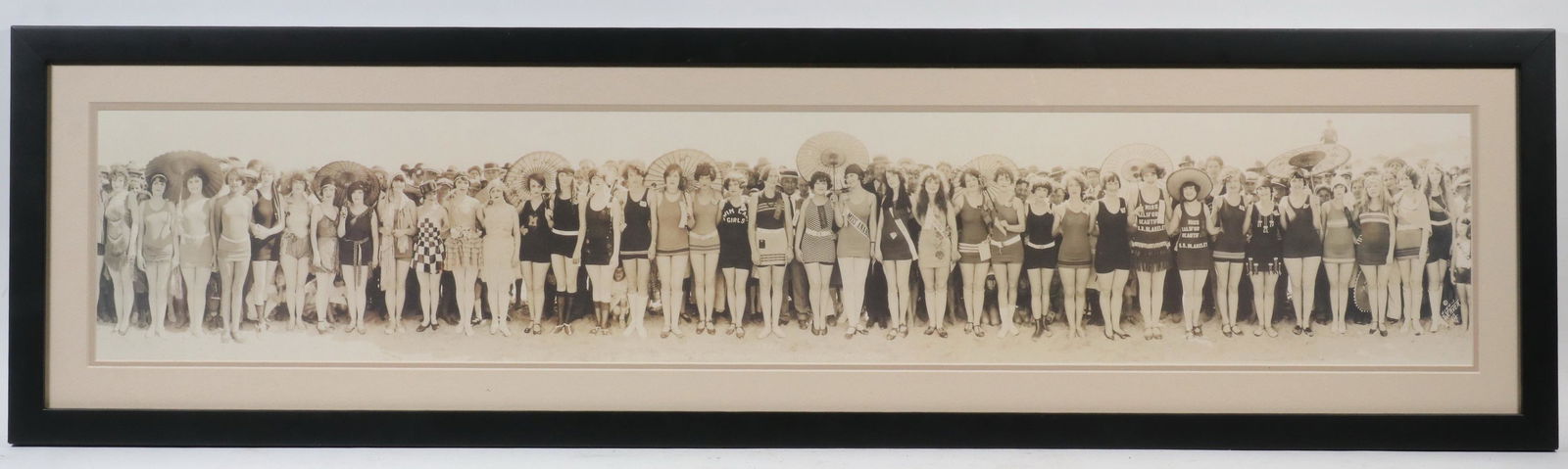 1925 CALIFORNIA BEAUTY CONTEST PANORAMIC PHOTO COPY: Framed Copy of a Group Photo from the 'Bathing Beauty Contest, Huntington Beach, Calif., 1925', original image by photographer Miles F. Weaver, depicting the line of contestants in bathing suits, with