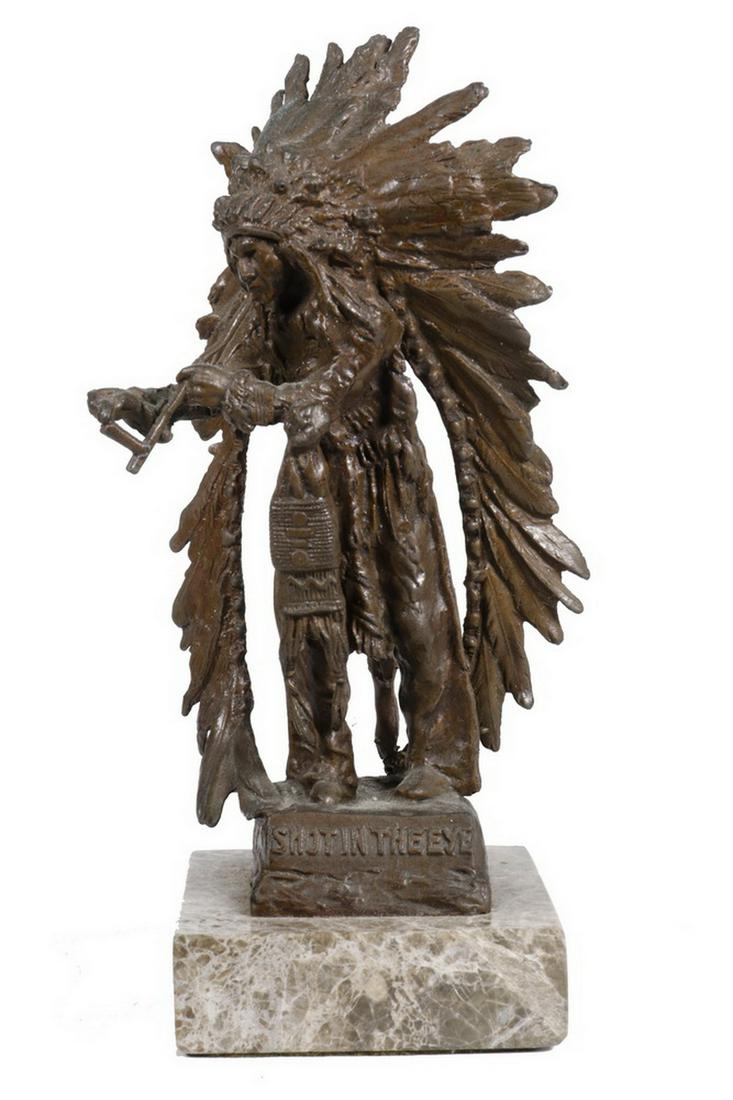 CARL KAUBA (AUSTRIA/US, 1865-1922): "Shot in the Eye", bronze sculpture, signed to right edge of base, depicting a Native American chief in full headdress smoking a pipe, also marked '1451' and 'Austria' verso, mounted on a square tan m