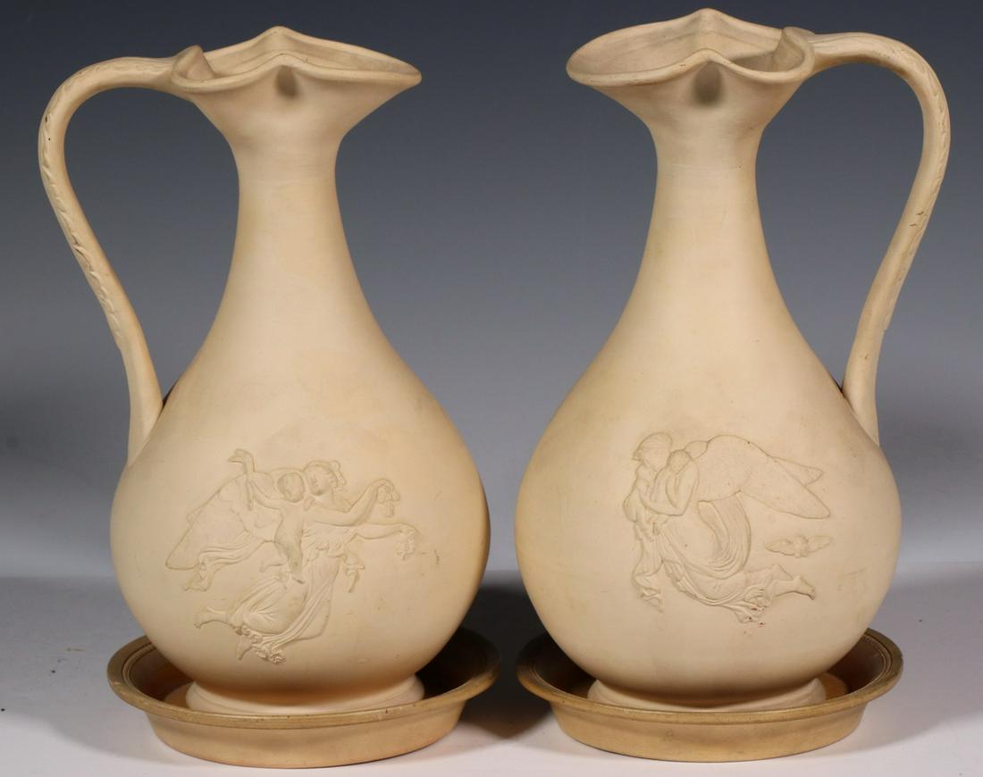 PR OF 19TH C. GERMAN BISCUITWARE EWERS WITH LIDS AND: Caramel Colored Greek Form Ewers with relief decoration of classical figures, stamped "H.P.N.' in German Gothic letters on underside of ewers only, 11 1/2" x 6" ewers, 7 1/2" underplates (which have p