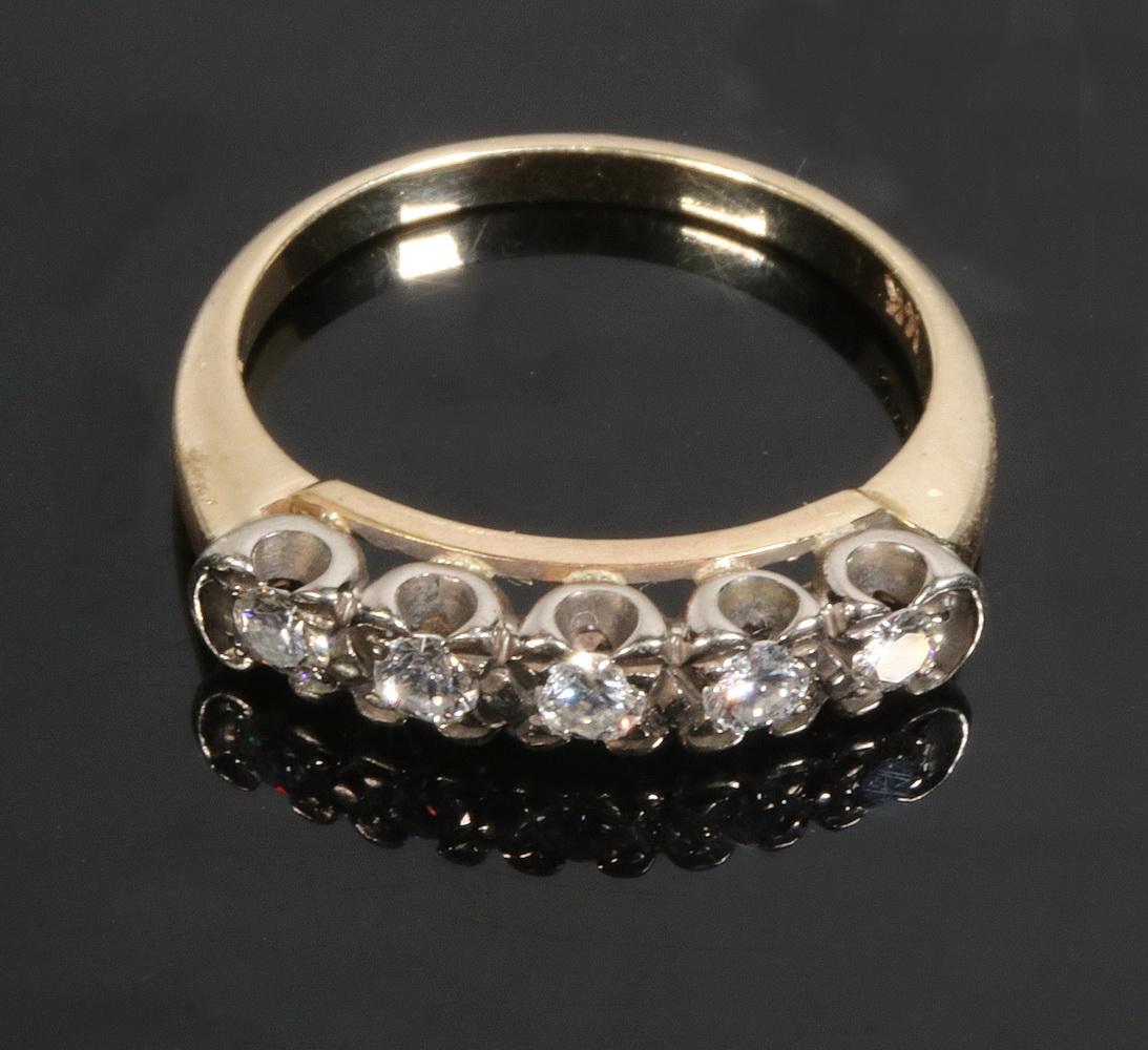 LADIES 5 STONE DIAMOND BAND RING: 14k yellow gold with white gold setting. 1/4 ct. total weight. 1.4 dwt. Size 6-1/2.