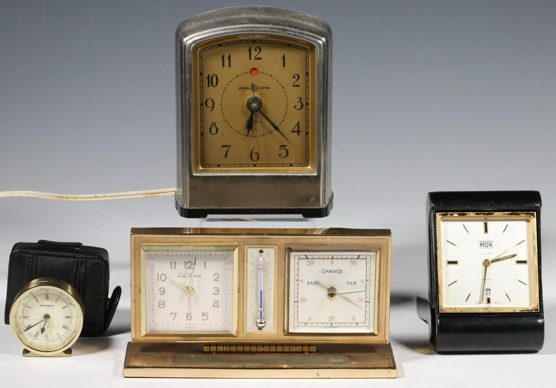 (4) SMALL CLOCKS: Lot of (4) Assorted Vintage Clocks, incl: 1950s General Electric streamline design electric alarm clock, model A 8716, sn 174899 B, 4 3/4" high, 3 3/4" x 2 3/4", not observed running, time adjustment