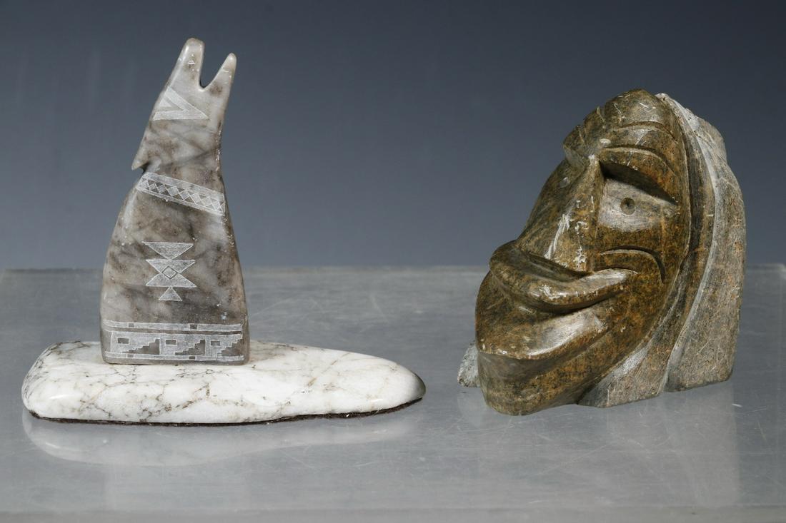 (2) INUIT CARVED STONE FIGURES: Late 20th c. Soapstone Carvings of a Howling Wolf, signed 'Ken Dewey', 4" x 4 1/4" x 1 3/4"; PLUS Ancestral Head signed 'Karin Thomas' and dated 2-14-85, 3 3/4" x 3 1/4" x 2". Light scratches and rubs