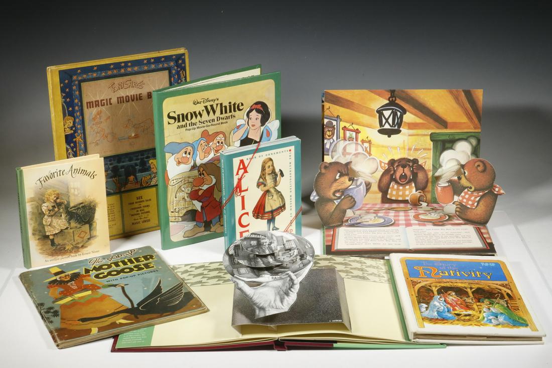 (20) INTERACTIVE CHILDREN'S BOOKS, MODERN: Including: "Tony Sarg's Magic Movie Book", 1943 (missing glasses); "The Pop-Up Mother Goose", 1934; "Walt Disney's Snow White and the Seven Dwarfs" Pop-Up Movie-Go-Round Book, 1981; "The Pop-Up Book o