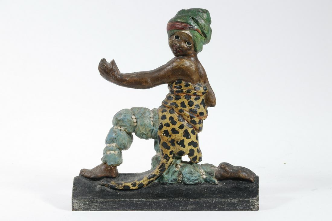 PAINTED IRON FIGURAL DOOR STOP: Vintage Painted Cast Iron Figural Door Stop, in the form of kneeling Moorish figure, 12 1/2" high, 11 3/4" x 2". Paint losses.