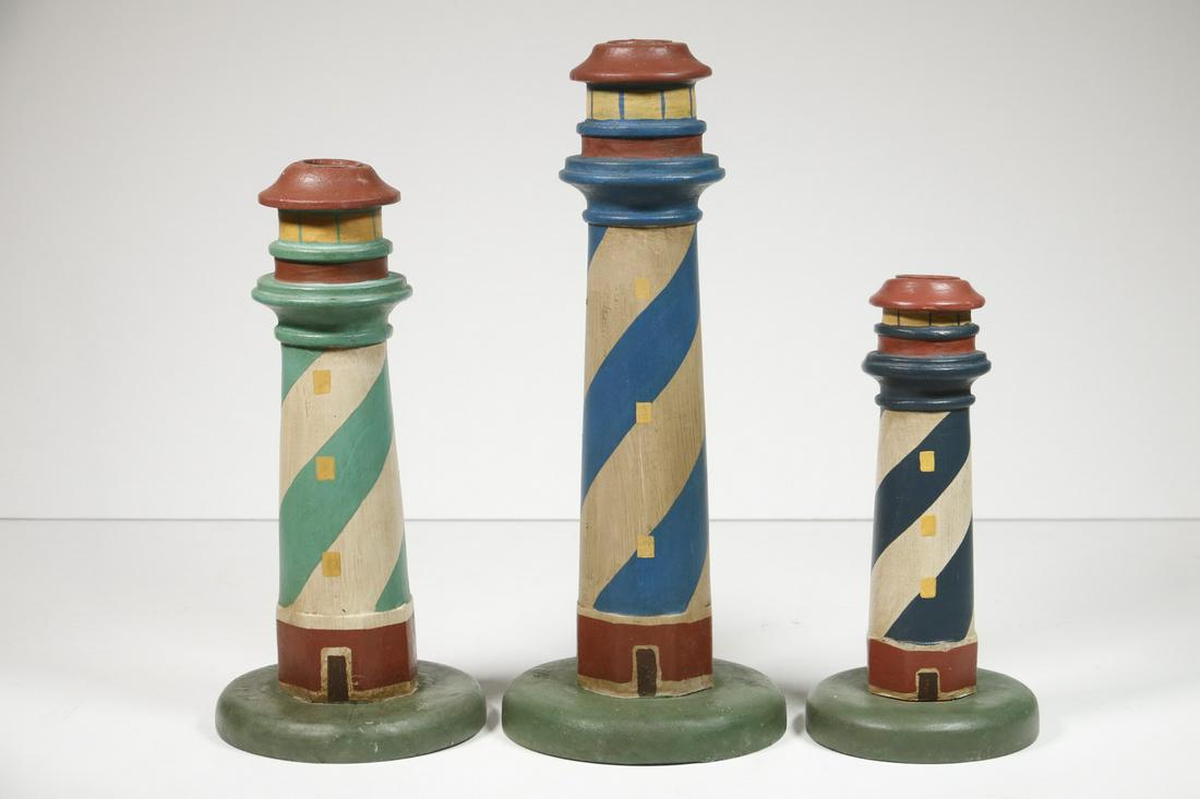 SET OF THREE GRADUATED LIGHTHOUSE FORM CANDLESTICKS (1 of 2)