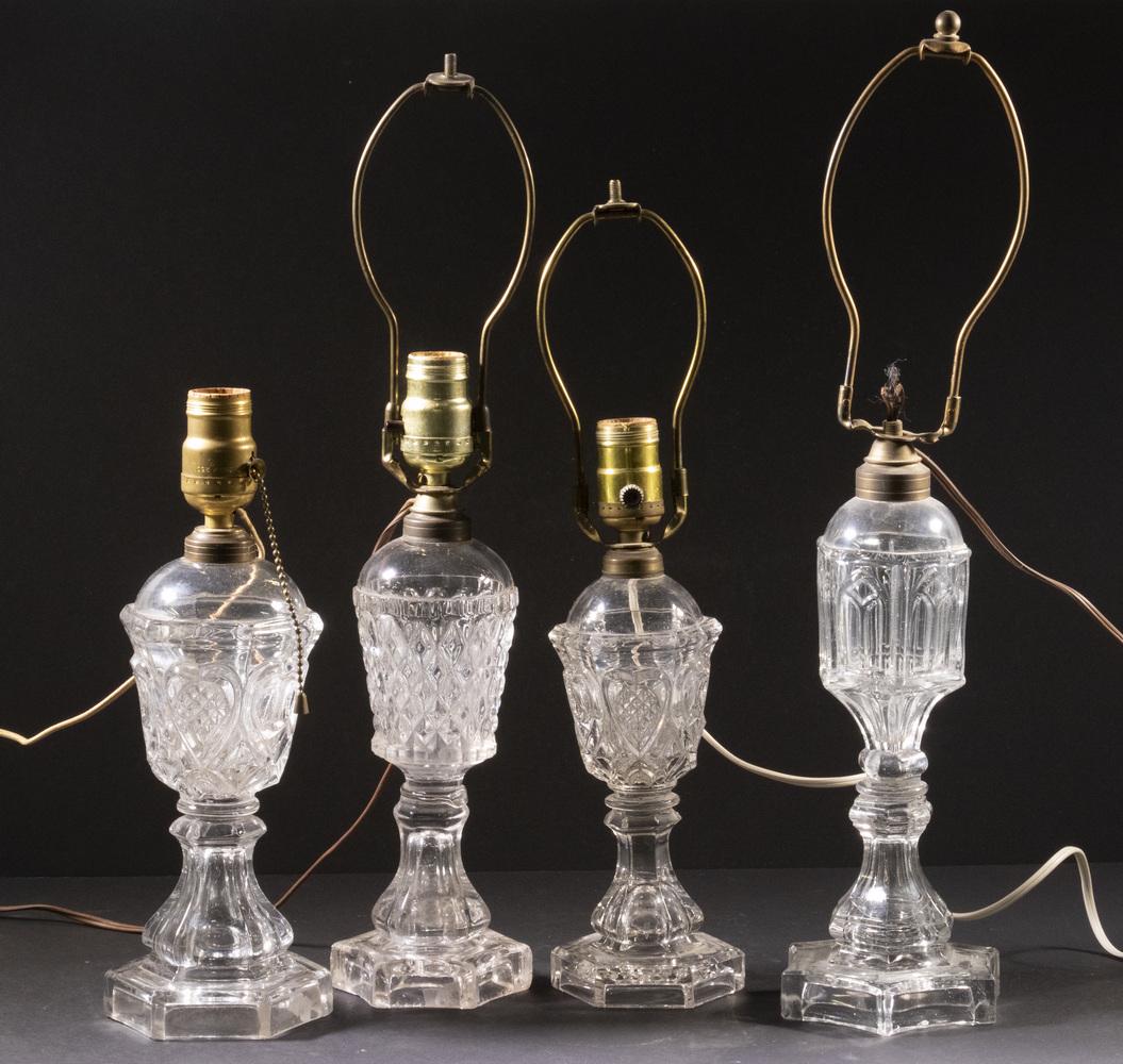 PATTERN GLASS WHALE OIL LAMPS, ELECTRIFIED: Group of (4) Early 19th c. Clear Pattern Glass Lamps, with electric sockets, not drilled, incl: (2) Heart & Waffle pattern flint glass lamps, Boston & Sandwich Glass Co., hexagonal bases, one with har