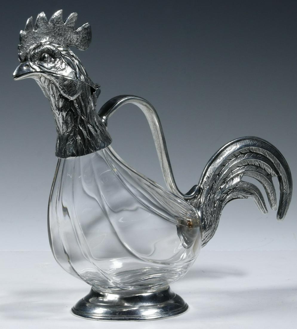 FIGURAL GLASS & METAL WATER PITCHER: Pewter rooster form decanter with clear glass body; Stamped Val Petrol Pewter.11" high x 13". Good condition.