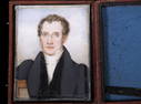 WATERCOLOR ON IVORY MINIATURE OF A YOUNG MAN