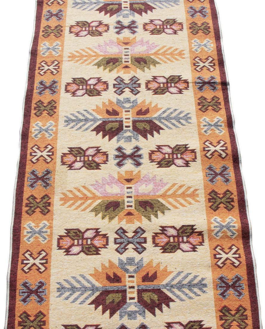 TURKISH KILIM RUNNER (2'7" X 12'9"): Machine made Kilim with a single column of geometric motifs and polygons in red, gold, beige and sky blue on the red field with medium blue "crab" border. Overall good condition.