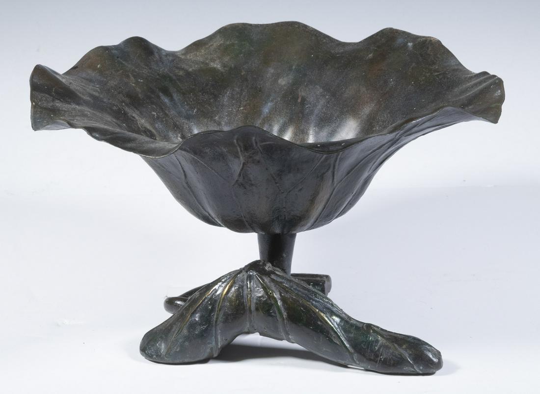 JAPANESE BRONZE LOTUS IKEBANA BOWL: Vintage Patinated Bronze Bowl, molded as a lotus leaf, with lotus leaf foot, marked "Made in Japan" on base, 7 3/8" high, 12 1/2" diam. Good condition.