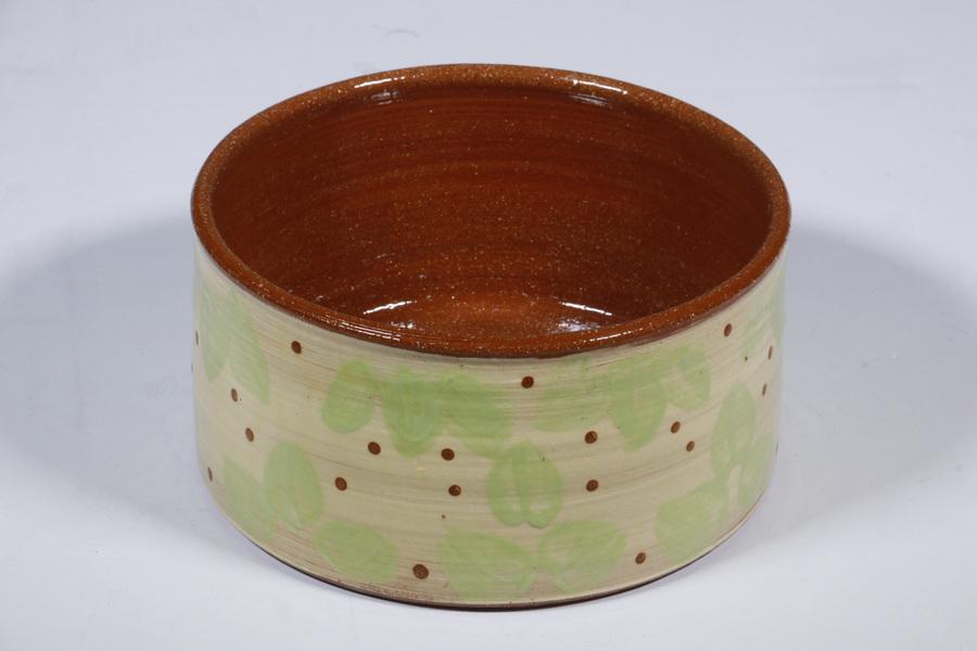 REDWARE BOWL: Round green painted redware bowl.