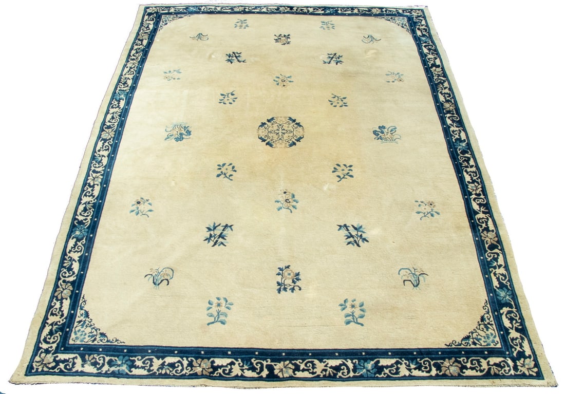 CHINESE CARPET (8"6" X 11"): Chinese carpet. Small rosette medallion flanked by flowering vines and bamboo, in blue-green, rose, sky and midnight blue, on the tan field with midnight blue lotus border. Good pile, some stains thro