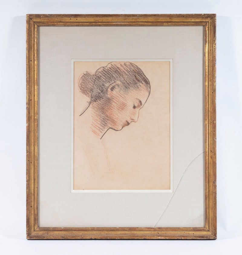 MOSES SOYER (NY, 1899-1974): Profile Head of a Woman, facing right, red and black conte crayon on oaktag, faintly signed in white lower right, in gilt molded frame under green silk dimensional mat with white liner, UV glass (crac
